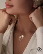 آویز طلا فرشته با گل صدفی - Image 2