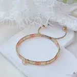 دستبند طلا و میوکی با آویز گل