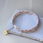 دستبند طلا و میوکی گل گلی با آویز گل
